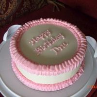 Ruffle Birthday Cake Lemon cake, raspberry BC filling, vanilla BC icing. practicing my ruffles.