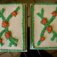 Poinsettas Lemon cake with lemon bc filling and icing as requested by customer. BC poinsettas and pine swag added b/c it was for an office Christmas...