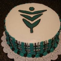 Universal Arts Pharmacy Cake This cake was made for my job, just for practice =). It is a 2 layer 9 inch round with a tilted design to show off the chocolate transfer...