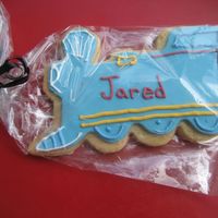 Train Cookie NFSC with satin ice rolled fondant, RI details. Thomas the train colors. Could not find my camera before bagging, then found days later. My...