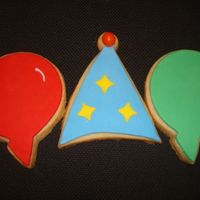 Party Hat Cookie With Balloon Cookie Friends! NFSC with Rolled Satin Ice Fondant and a red candy top. I used a mini-cutter to get the inside design with another color on the hat. The...