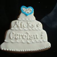 Wedding Cake Cookie For Bridal Shower NFSC covered with fondant and antionia74's RI. Made this one for the bride-to-be only. I was excited to test out this new cutter but...