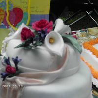 Calla Lily Birthday Cake this is a close up of the top of the cake that i made for my grandma's 90th b-day party. this is my first attempt at gum paste calla...