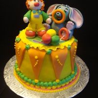 Circus Cake just playing around with different techniques and decided to make a small circus cake. Gumpast/fondant figures, fondant accents,...