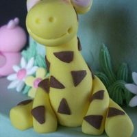 Happy Giraffe gumpaste giraffe for a baby cake. Thanks to the cake central users for the inspiration!