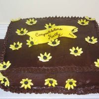 Easty Birthday 2 This cake is a survivor! 10 hours in a car and then an attack by 2 6 year olds who pulled off the flowers and stuck their fingers in the...