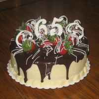 Birthday Cake This cake was a lot of firsts for me. I got all my ideas from this site. It is a yello cake with ganache filling covered in BC, ganache and...