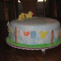 Clothes Line Cake I got the idea for this from this site. Did my best recreate it. I am fairly new at this. My friend loved it, it was for her sister's...