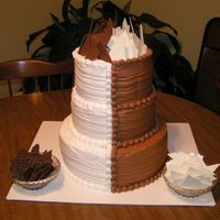 Black And White Cake My husband graduated from nursing school and couldn't decide what kind of cake he wanted so I made it half chocolate and half white....