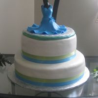 Elisa's 60Th B-Day! This cake was done for my mother-in law who does wedding and party dresses. She loved it.