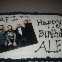 Afi Cake Made for my son's birthday. Covered in buttercream. Photo was laminated then put on parchment paper onto the cake.