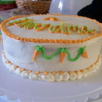 Carrot Cake Carrot cake covered in cream cheese icing.