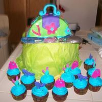 Purse Cake 1st cake purse I tried. Strawberry /vanilla swirl cake covered in MMf.