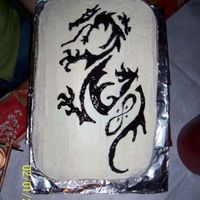 Dragon Cake This cake is red velvet with a cream cheese frosting. The dragon is an exact copy of the birthday girls tattoo. I took the tattoo print and...