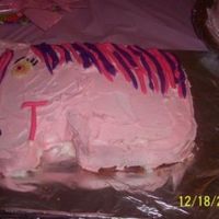 Pony Cake This was for a 6 year old bday party. She wanted a My Little Pony theme so we went for a pink and purple pony of sorts. I just used a...