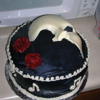 Phantom Of The Opera Inspired by PinkPanther but no where as good. Mask made of almond bark and flowers.....well they were my first. It was a quick job but...