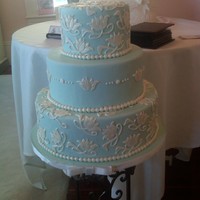 Wedding Cake For Bridal Show Fondant covered cake with tulip cutouts using the Patchwork cutters.