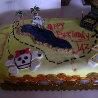 Treasure Scroll Map 1/4 sheet cake covered in MMF, sprayed with yellow food coloring and bronze dust added for wear and tear effect. sparkling blue gel for...