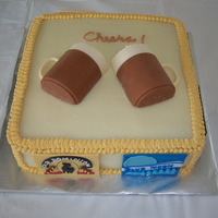 Beer Cake 4-layer beer cheese cake with bacon cheddar cream cheese filling and cream cheese frosting. Beer mugs on top are solid chocolate and the...