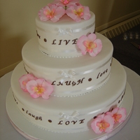 Live Laugh Love Wedding Cake Cakes covered in fondant with gumpaste orchids and lettering. TFL!