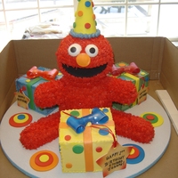 Elmo 1St Birthday Cakes iced in buttercream with fondant accents. Thanks for looking!