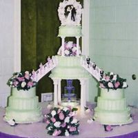 My Nieces Wedding Cake May 2004 The frosting was a lovely soft green, the cakes were different flavors - homemade carrot, dark chocolate, french vanilla, lemon, banana....