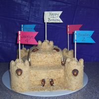 Sand Castle Cake This was a birthday cake for my two children as well as myself. The cake is made of 2 16x16 and 2 8x8 in a french vanilla mix, & 15...
