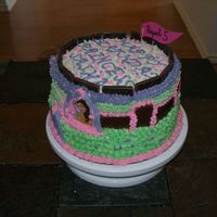 Disney Princess I baked this princess cake for another neighbor's daughter. The first three layers are yellow cake with buttercream and the second...