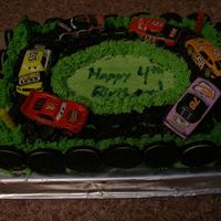 Racetrack My four year old son wanted cars, cars, and more cars for his birthday cake. The racetrack is made of crushed Oreos and the frosting is...