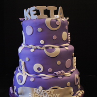 Purple, Silver, And White Cirlce/dot Cake This cake was a first for me. A first in the fact that I finally got to make the circle dot combination. I have seen this design on here a...