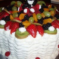 Sunday Brunch Choc. cake filled with fresh raspberries...covered with fresh fruit...