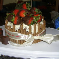 Chocolate Covered Strawberries Festive Cake My 4 1/2 & 2 year old made this cake for their daddy for his birthday. I only helped with the bow, the oven part & clean up! They...