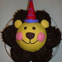 Circus Lion Cake For My Son's 2Nd Birthday This cake was made using the Wilton circus cat as an inspiration. I used half of the ball pan, and the flower pan. I bought the Wilton...