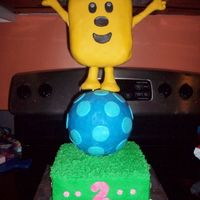 Wow Wow Wubbzy I made this cake for my daughters 2nd birthday. Wubbzy is crispy rice treats covered in fondant, the ball is styrofoam covered in fondant,...