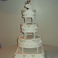 Wedding Cake This is a 4 tier cake yellow cake w/ strawberry filling.