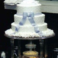 Lovely Lavendar This was a cake I did for my brothers wedding. The bow is lavendar fondant.