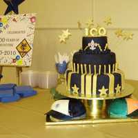 Cub Scout Blue & Gold Banquet Thanks to Boween and Kim McCall for inspiration. This cake had the 4 pack caps as the bottom tier with a 3 tier 14, 10, 6 above. The cakes...