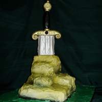 Sword In The Stone For my young Prince...grandson. :) Cakes stack, carved, and airbrushed. Sword is fondant and gumpaste and inspired by Felicitaartjes....