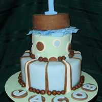 Blue-Brown-Green 1St Birthday 1st Birthday Cake -10" & 6" used dowels to prop cake top. choc/vanilla and white/raspberry. Buttercream covered in Chocolate...