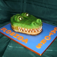 Groom's Cake - Florida Gator Being a die hard LSU fan, I did suggest a Gator Gumbo...grin... Carved Pumpkin Spice Cake with Cinnamon Cream Cheese Filling covered in...