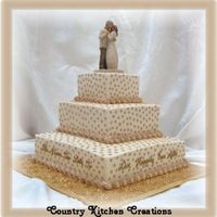 Square Wedding Cake Thanks to JenM75 for allowing me to use her design. 14,8,5" tiers- WASC base- triple chocolate fudge middle and top layers- the saying...