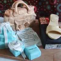 Designer Shoppers Dream Created for a lady that has a complete passion for fashion & shopping. The Cloe handbag is lemon madeira, the Diesel shoe box is...