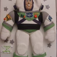 Buzzlight Year - To Infinity & Beyond! 2D buzz using the spaceman wilton cake pan. As I find this pan quite boring I decided to cut the arms & the legs out to give it a bit...
