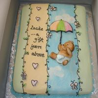 Bear And Umbrella Simple white cake that was fashioned after the plates and napkins.