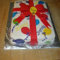 Balloons White cake with strawberry filling. Candy clay balloons with fondant bow.