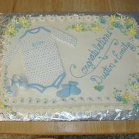 Dylan's Onesie White cake with Bc and fondant accents.