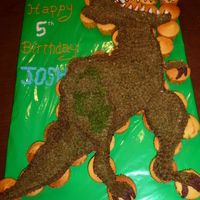 T-Rex Cupcake Cake Break-away cupcakes..much easier than cutting cake at a kids birthday party!