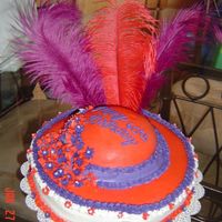 Red Hat 60Th Birthday Cake Darn Good choc with butter cream frosting. This was fun to do but do not like the flowers they were to samll for the cake. I purple band...
