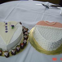 Bride Dress And Groom Tux This is my finish cake adding the strawberry tuxs around the cake. Bride dress is 10" white heart cake with buttercream frosting, tux...