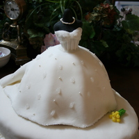 Chey's Wedding Dress This is a bridal shower cake for the daughter of a dear friend. I copied the details of her wedding gown.